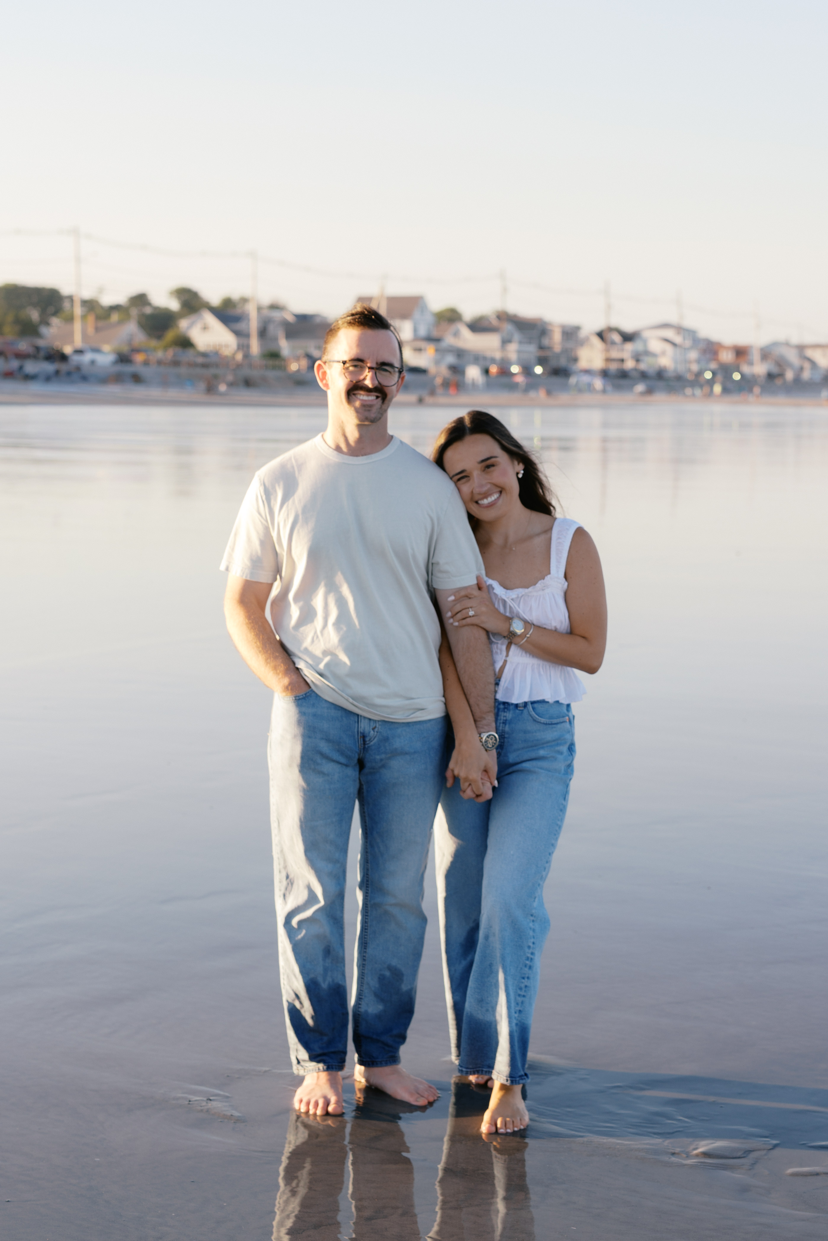 Julianne and Morgan standing together at the waterfront